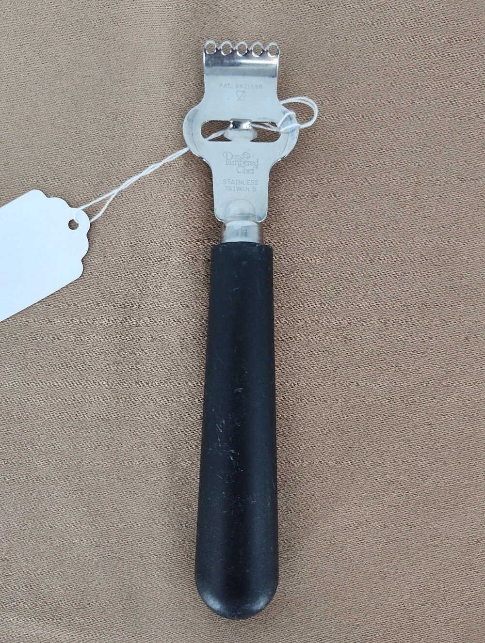 Pampered Chef Stainless Steel Zester with Black Plastic Handle